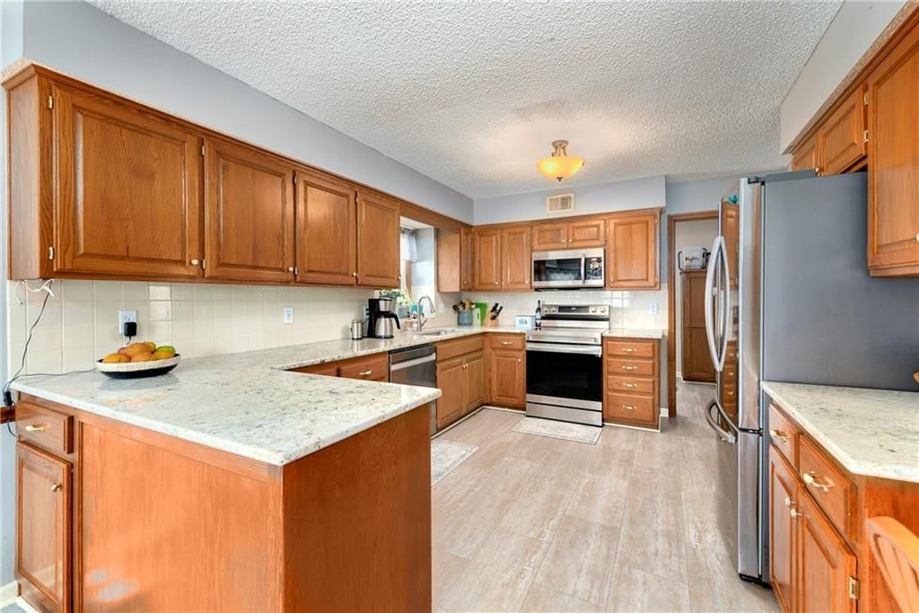 1204 NE Hunters Road — photo 13
