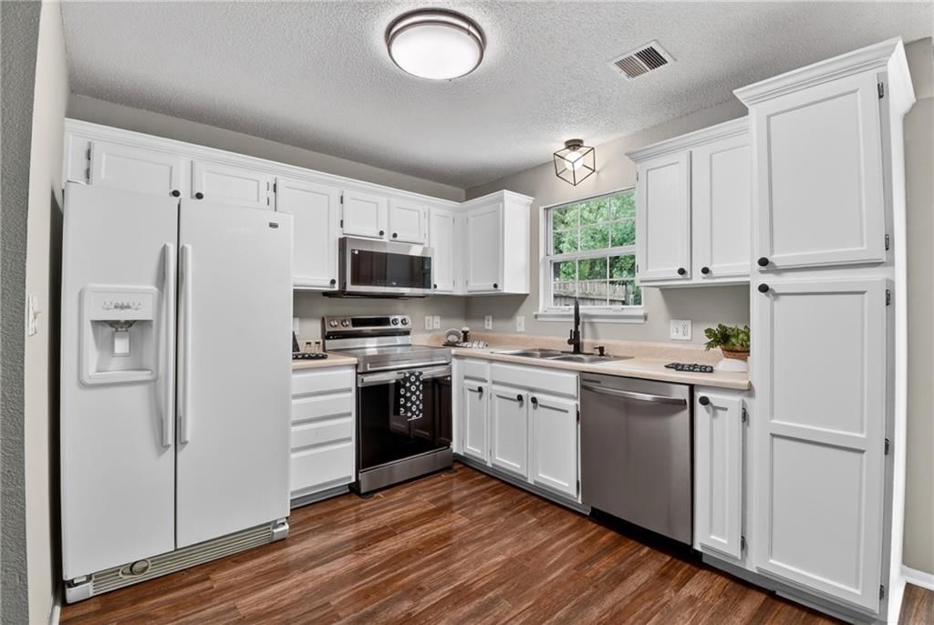 5615 NW Plantation Drive — photo 11