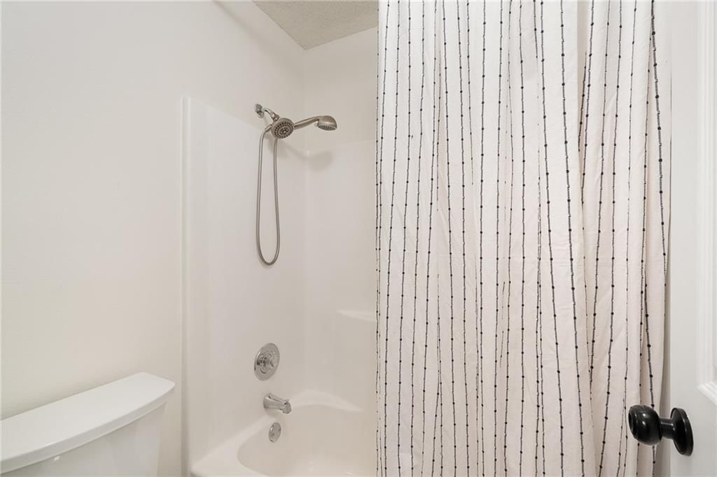 4612 NE Whispering Winds Drive — photo 32
