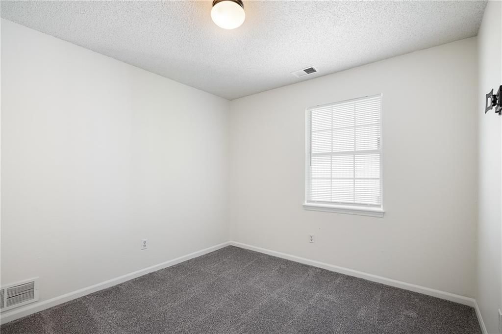 4612 NE Whispering Winds Drive — photo 33