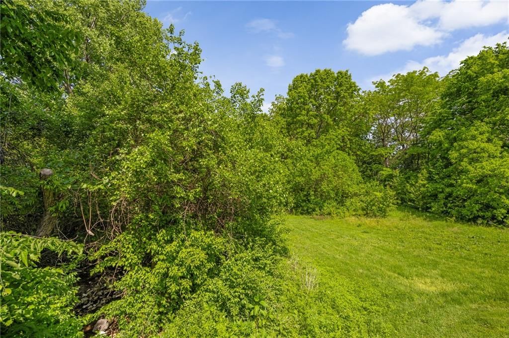 4612 NE Whispering Winds Drive — photo 34