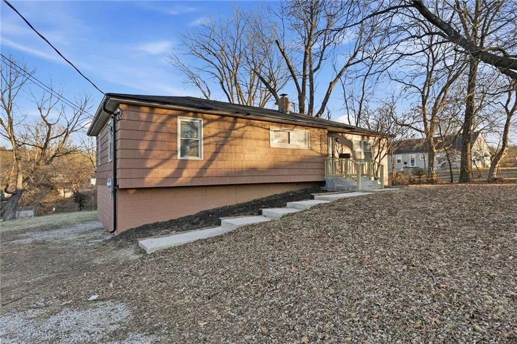 7867 James A Reed Road — photo 2