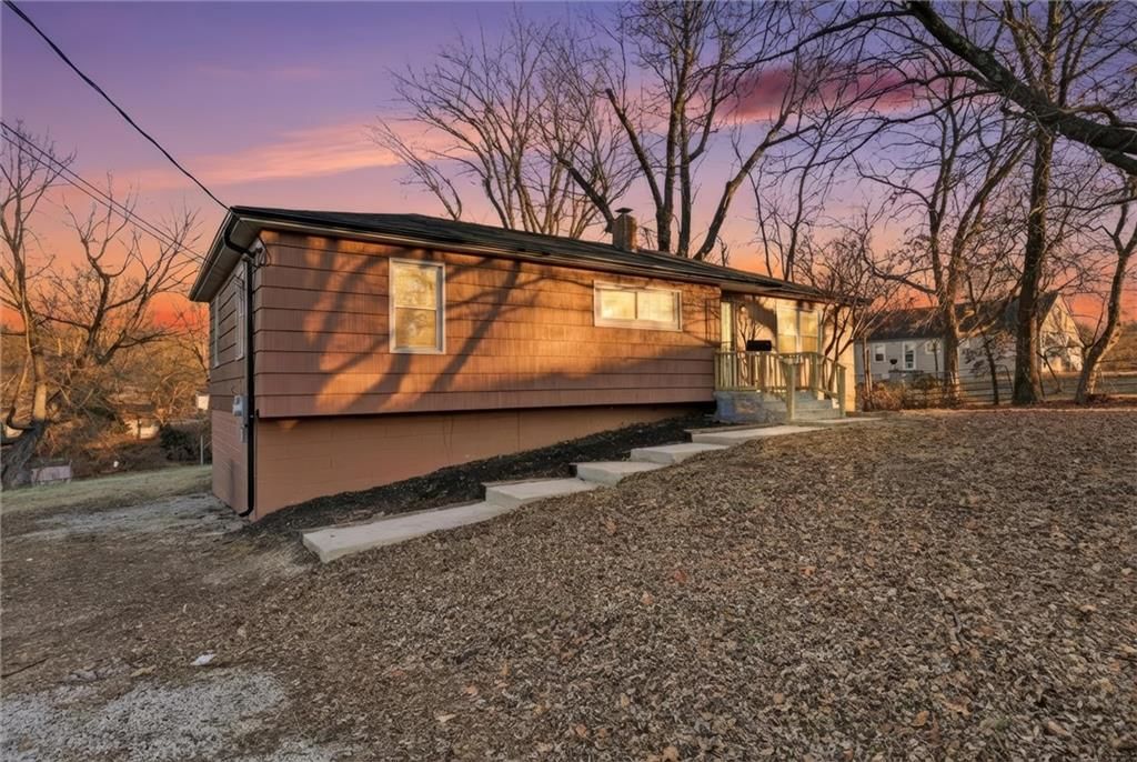 7867 James A Reed Road — photo 3