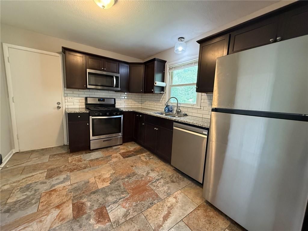 7413 Hedges Avenue — photo 7