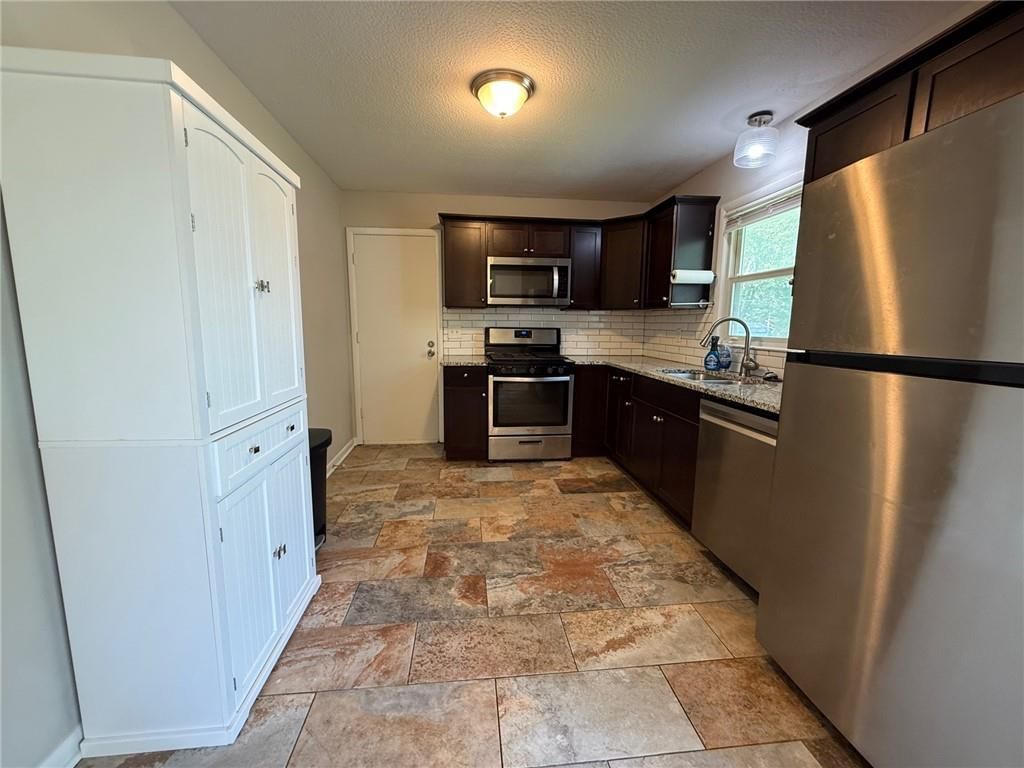 7413 Hedges Avenue — photo 8