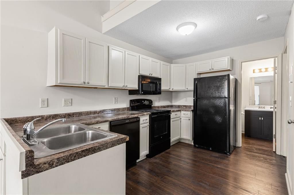 8644-8646 NW WAUKOMIS Drive — photo 6