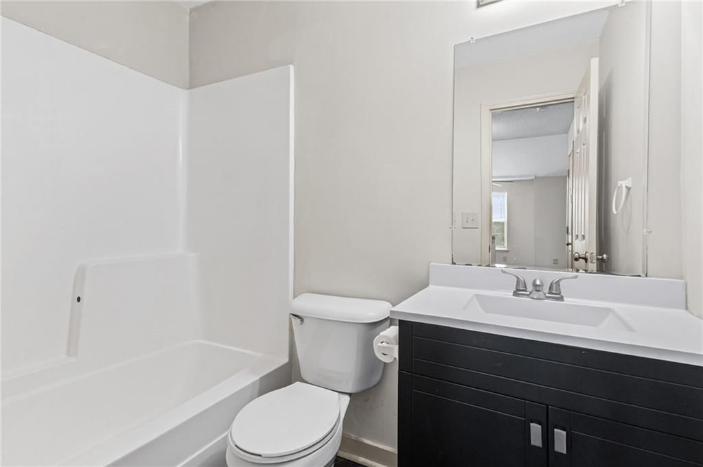 8644-8646 NW WAUKOMIS Drive — photo 11