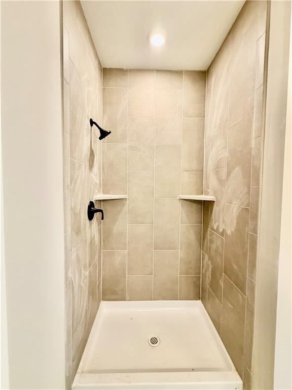 Walk-in shower and tiled shower at 504 Skyview Lane, Liberty, MO 64068