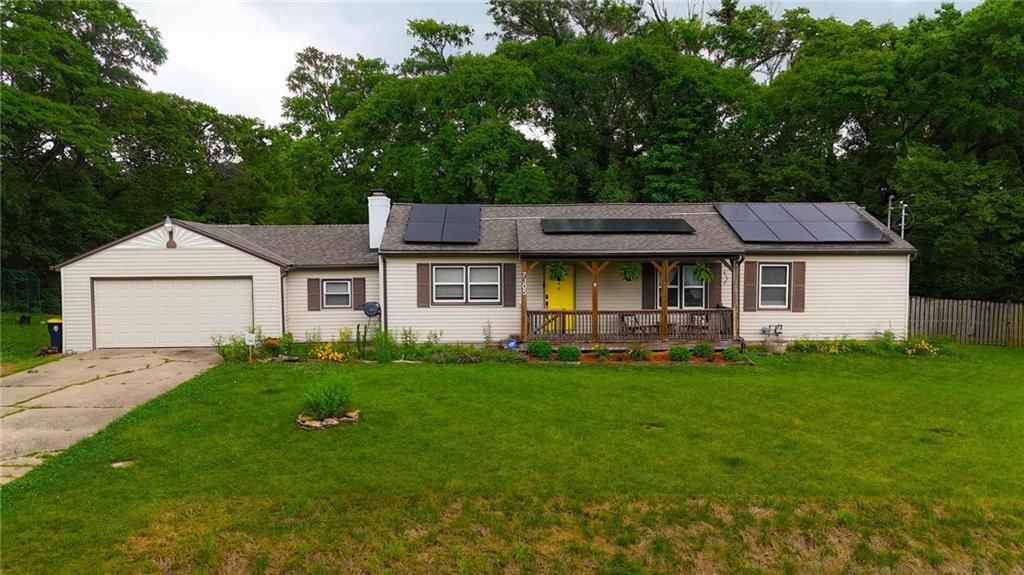 7305 James A Reed Road — photo 1