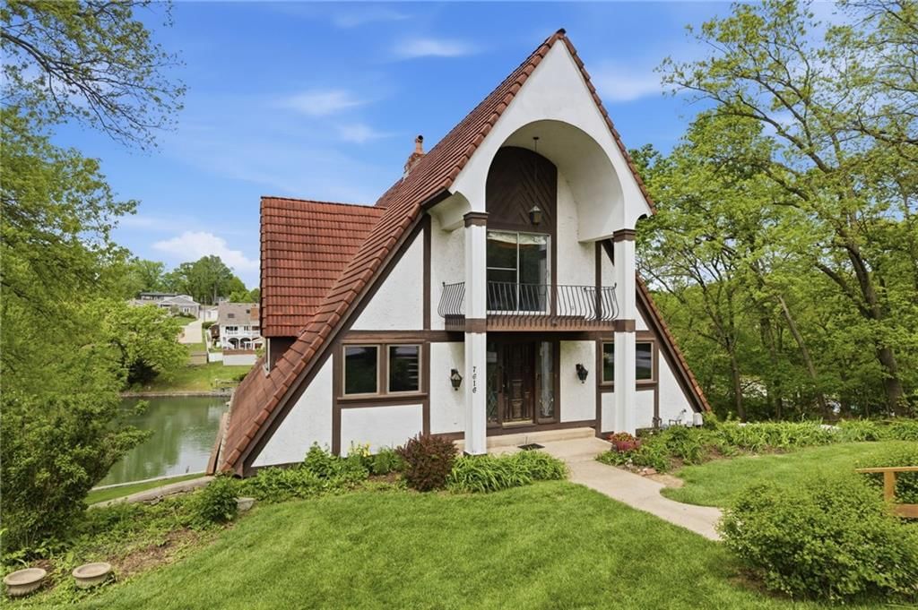 7616 NW Eastside Drive — photo 2
