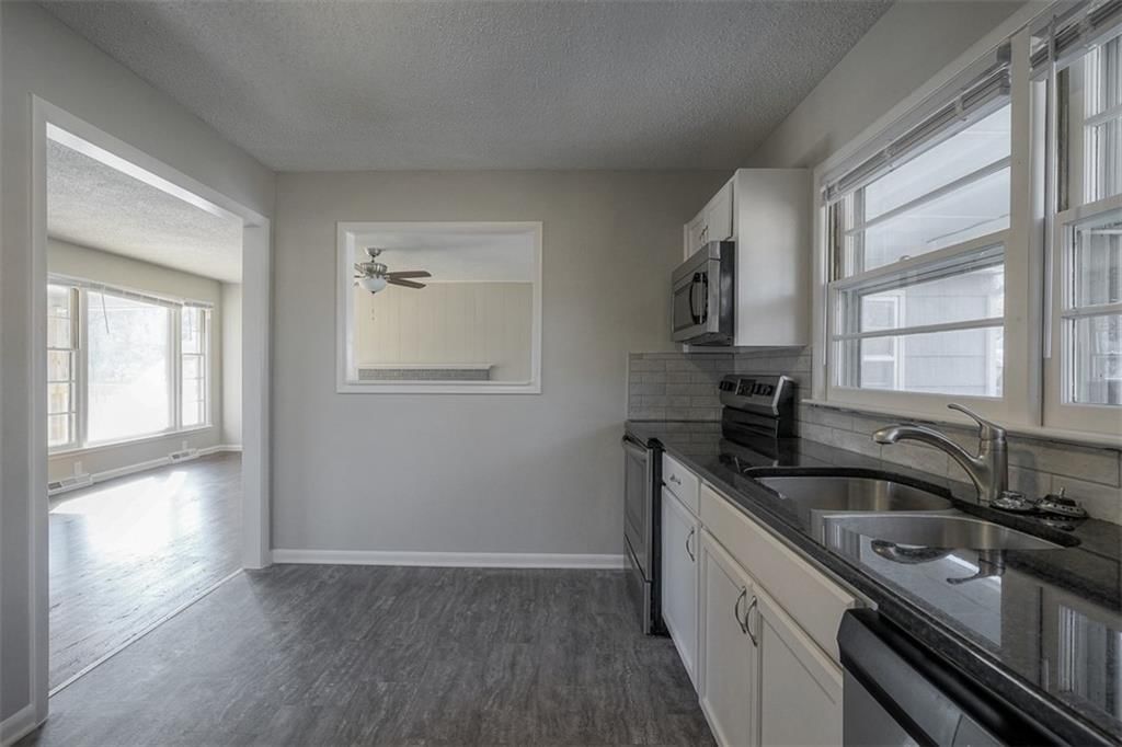 7857 James A Reed Road — photo 11