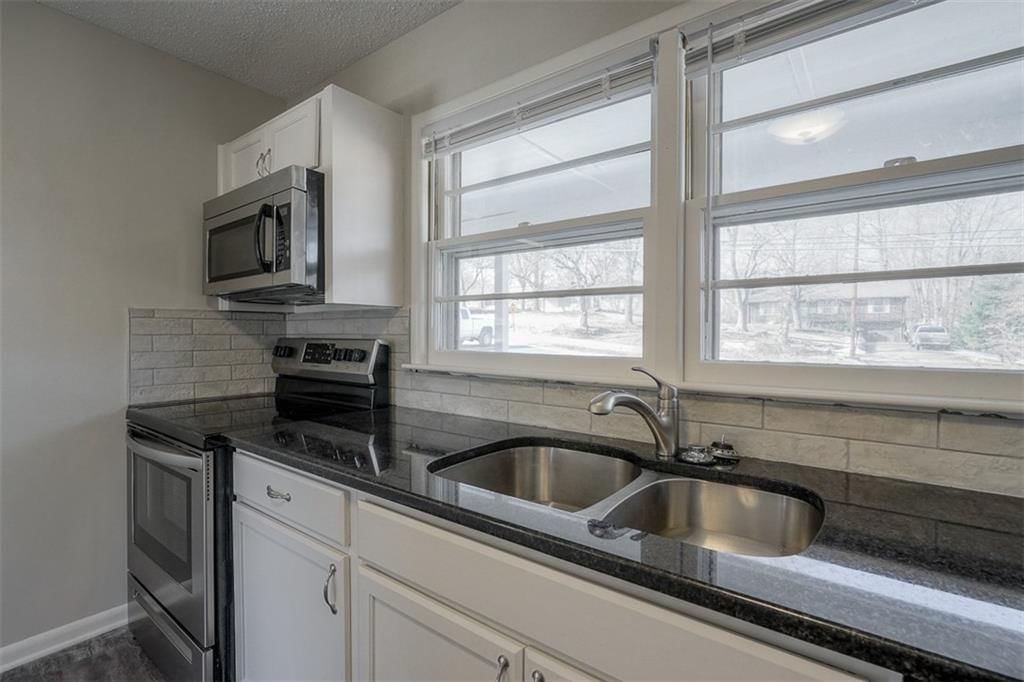 7857 James A Reed Road — photo 12