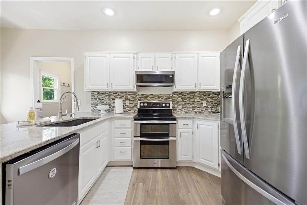 15013 W 77th Terrace — photo 14