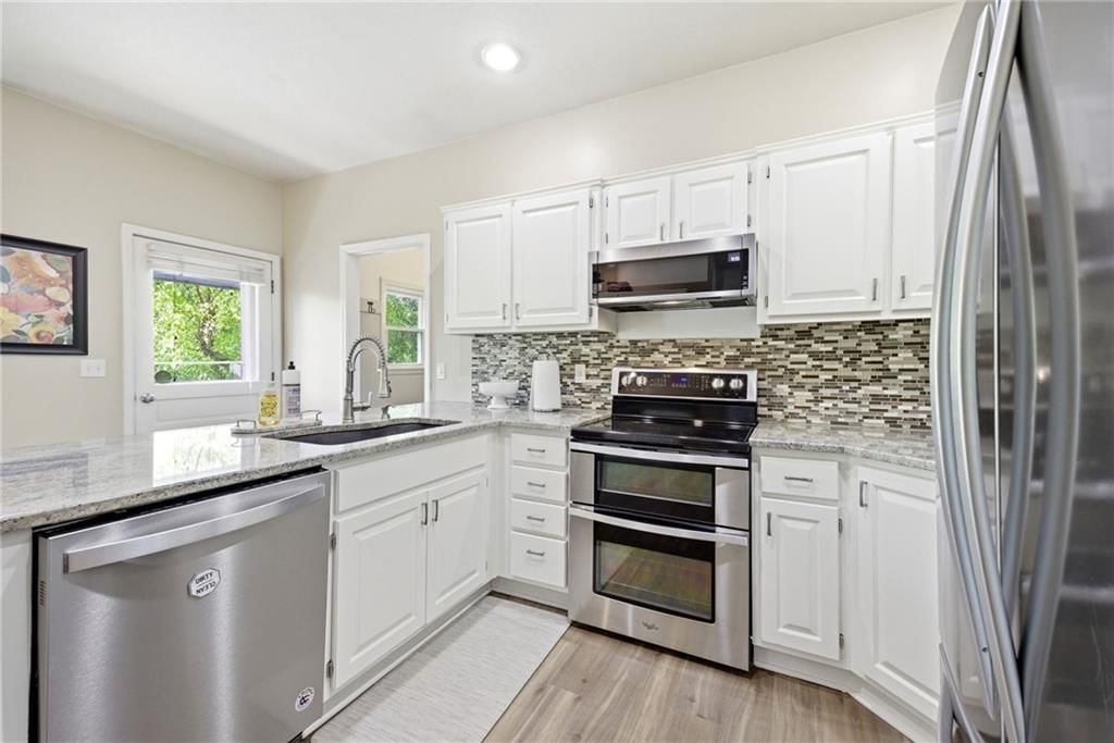 15013 W 77th Terrace — photo 16