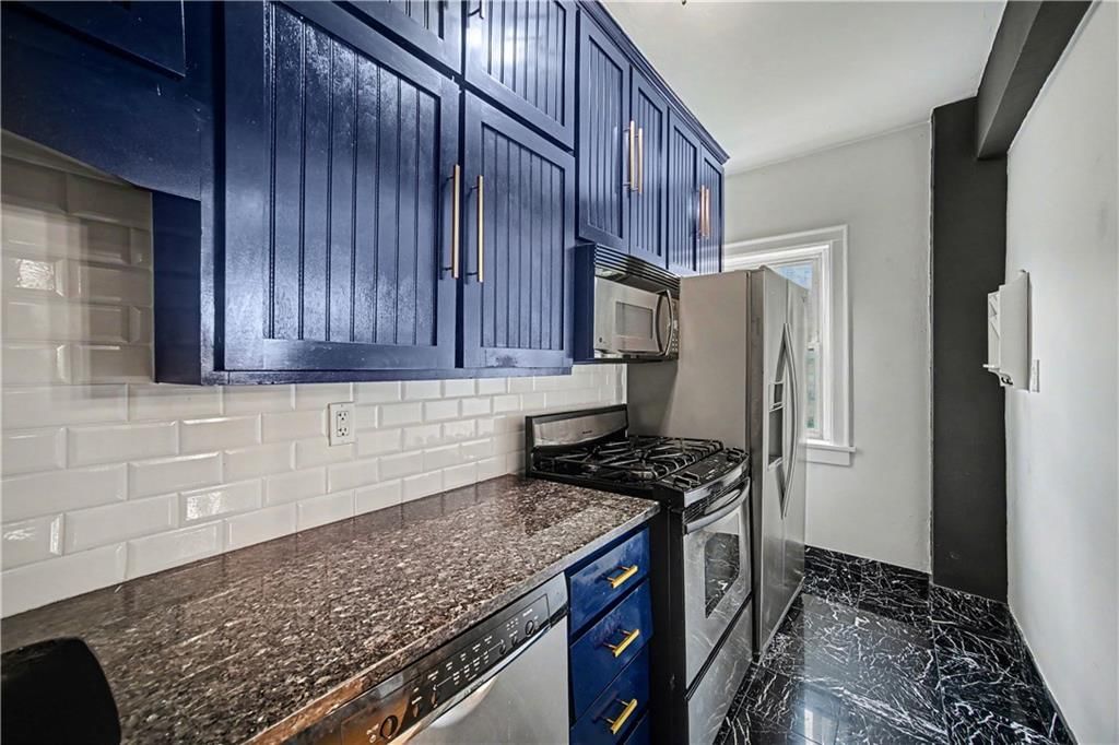 311 E Emanuel Cleaver Boulevard — photo 11