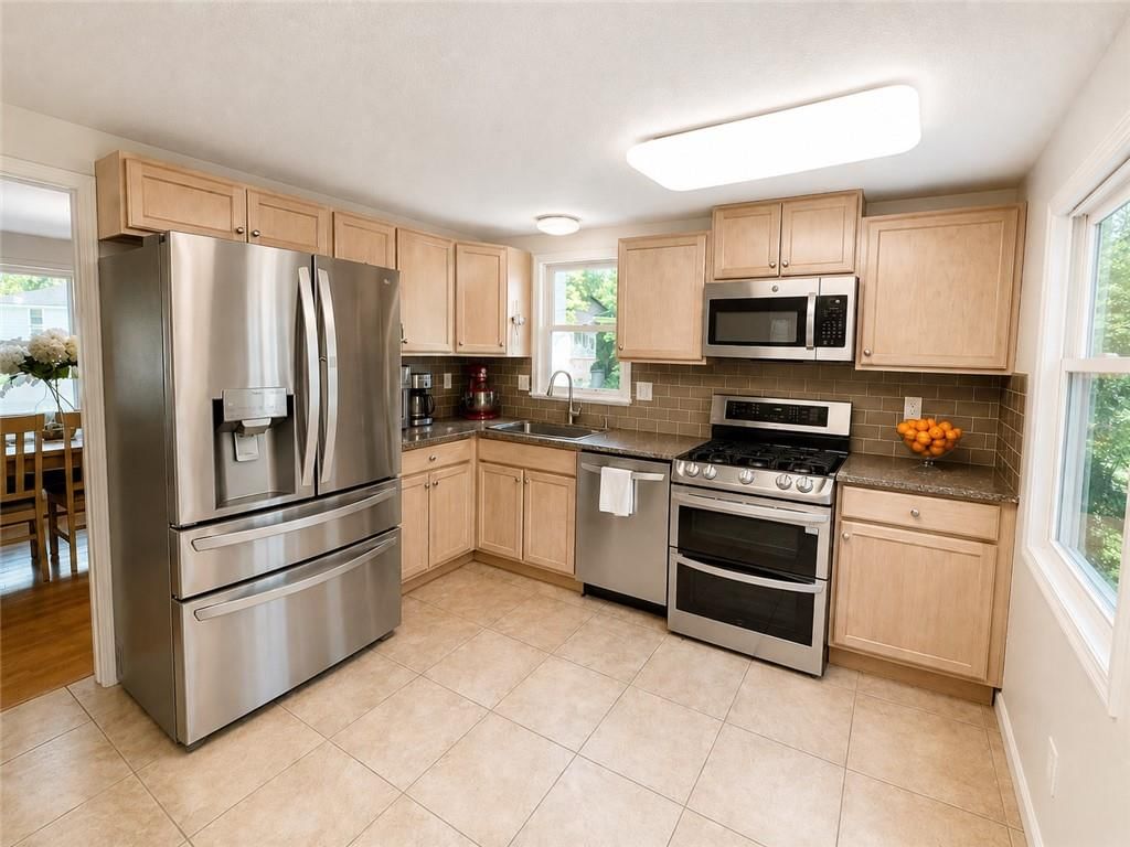 6607 NW QUAIL RUN Drive — photo 3