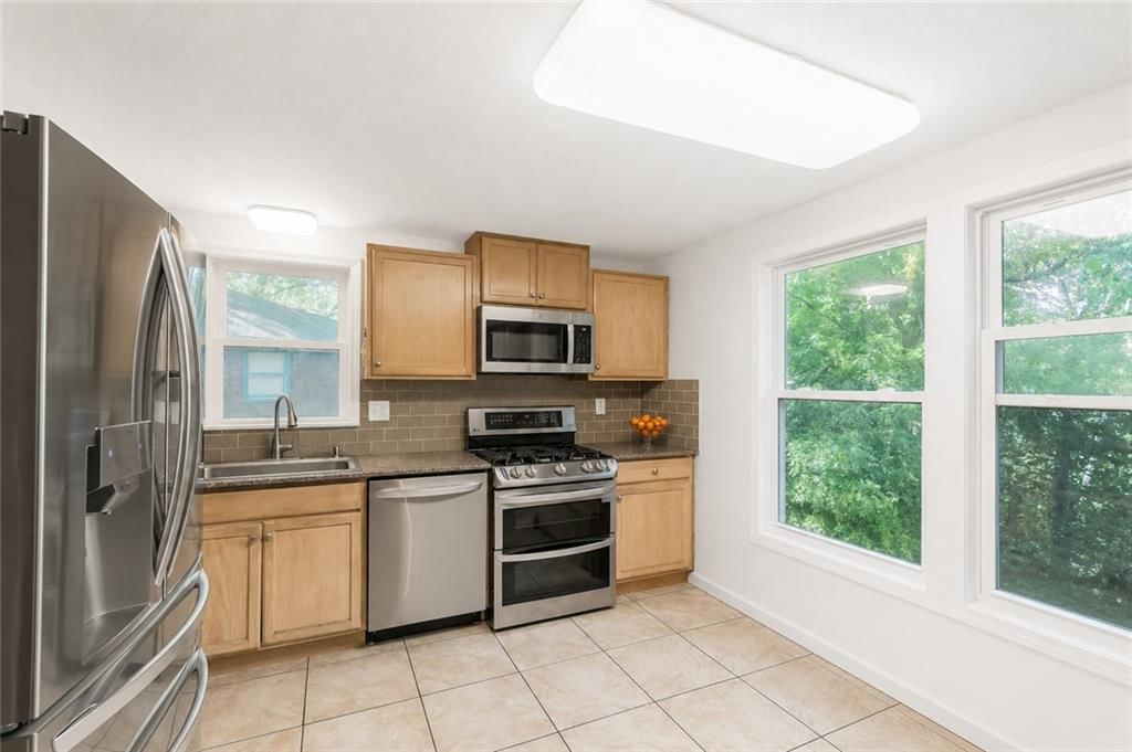 6607 NW QUAIL RUN Drive — photo 4
