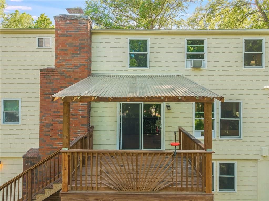 6607 NW QUAIL RUN Drive — photo 35