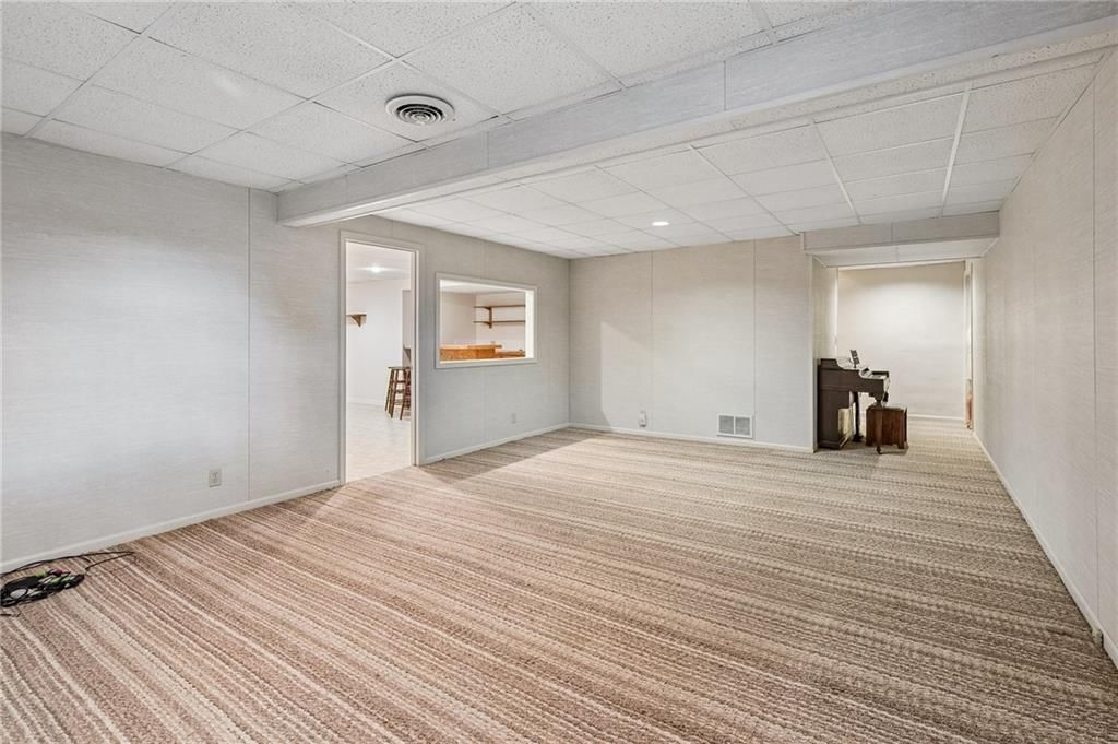 1025 SE Bridgehampton Way — photo 28