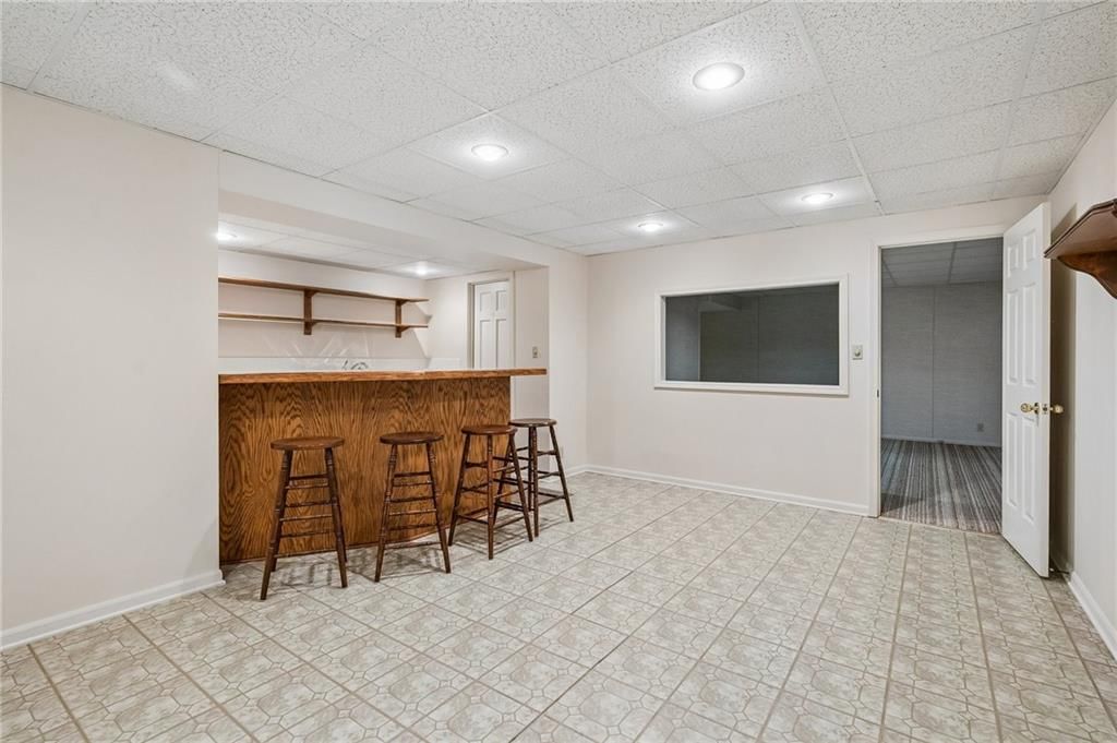1025 SE Bridgehampton Way — photo 31