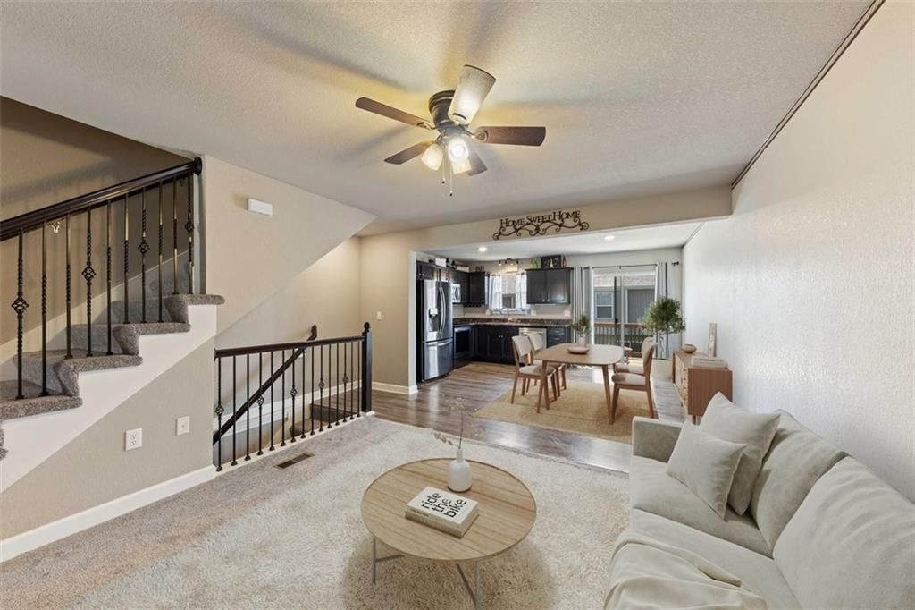 Photo 6 of 40 - 213 Pointe Lane, Raymore, MO 64083