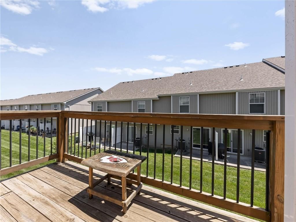 Covered patio, deck and wood deck at 213 Pointe Lane, Raymore, MO 64083
