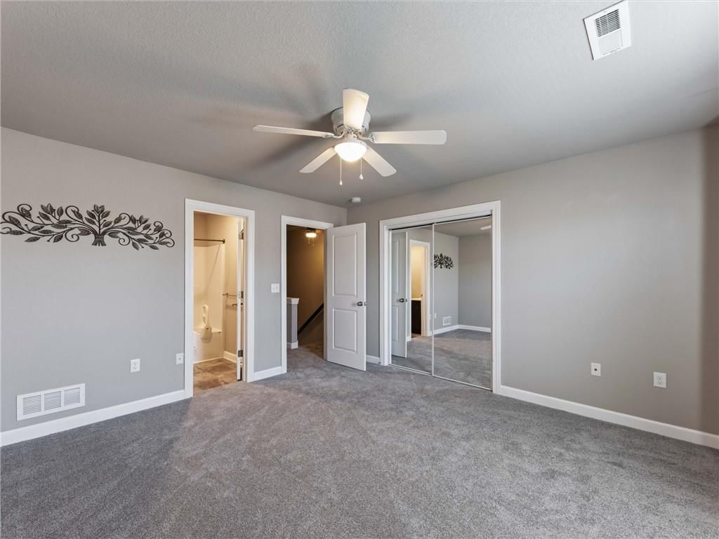 Carpet at 213 Pointe Lane, Raymore, MO 64083