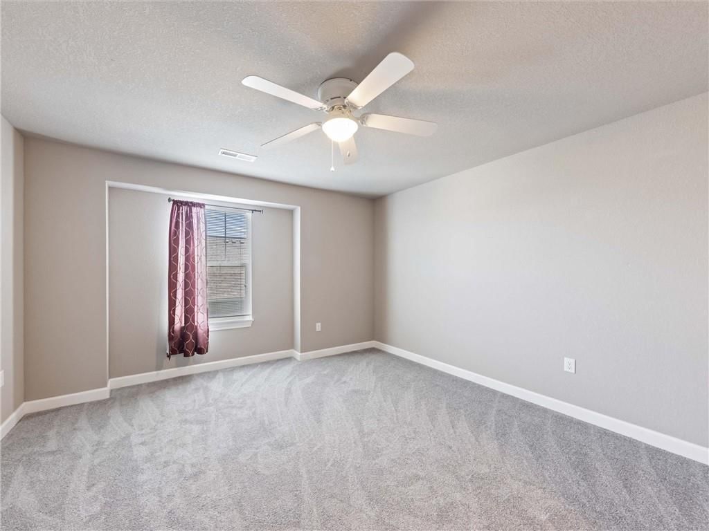 Photo 16 of 40 - 213 Pointe Lane, Raymore, MO 64083