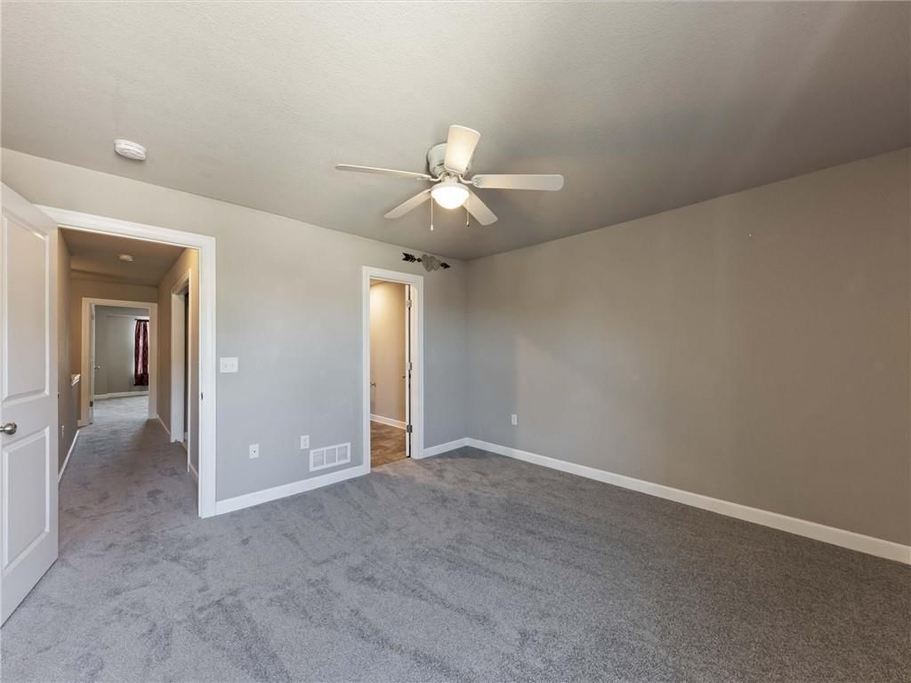Photo 19 of 40 - 213 Pointe Lane, Raymore, MO 64083