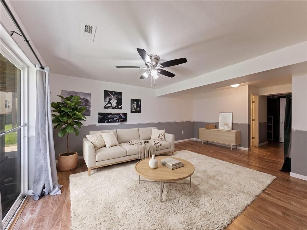 Accent wall, bonus room and wainscoting or board and batten at 213 Pointe Lane, Raymore, MO 64083
