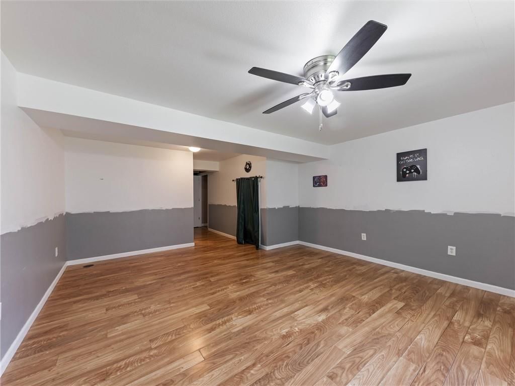 Photo 23 of 40 - 213 Pointe Lane, Raymore, MO 64083