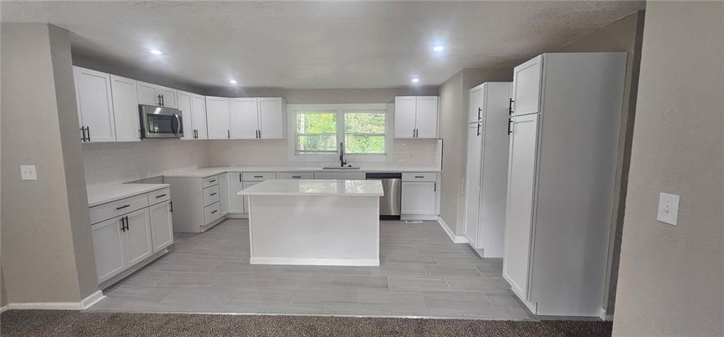 9025 James A Reed Road — photo 16