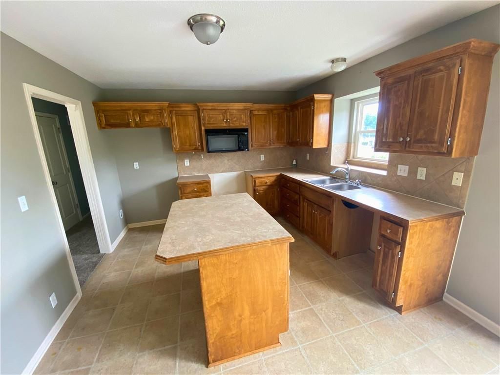 7104 E 163rd Terrace — photo 3