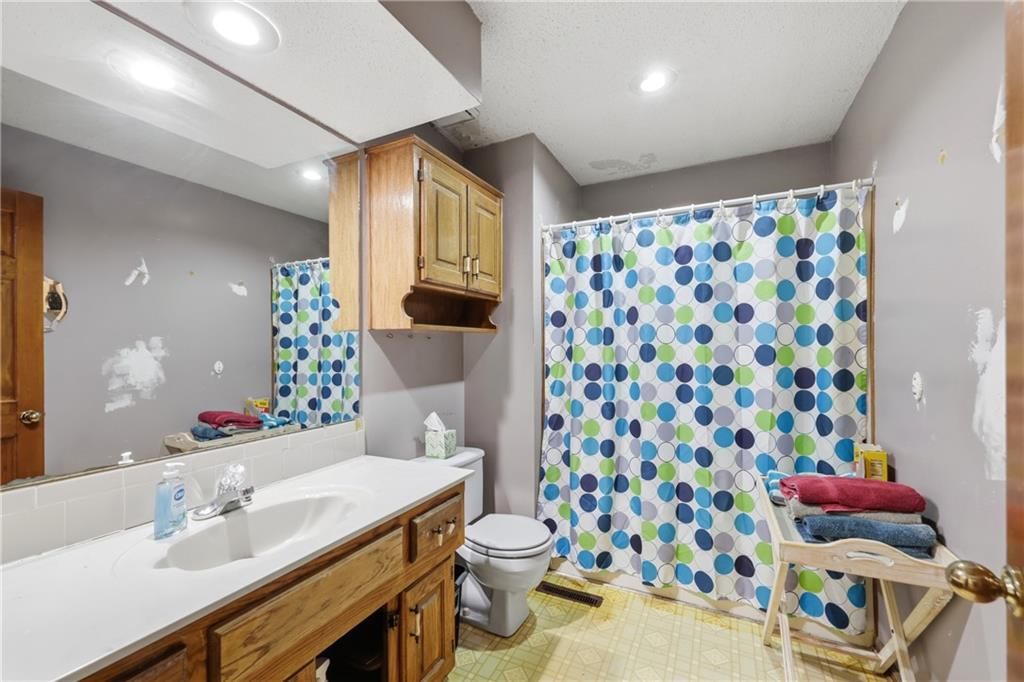 1402 NW Weatherstone Lane — photo 25