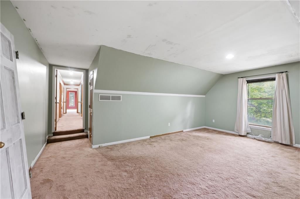 1402 NW Weatherstone Lane — photo 28