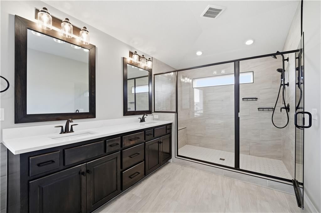 318 NW Ambersham Drive — photo 50