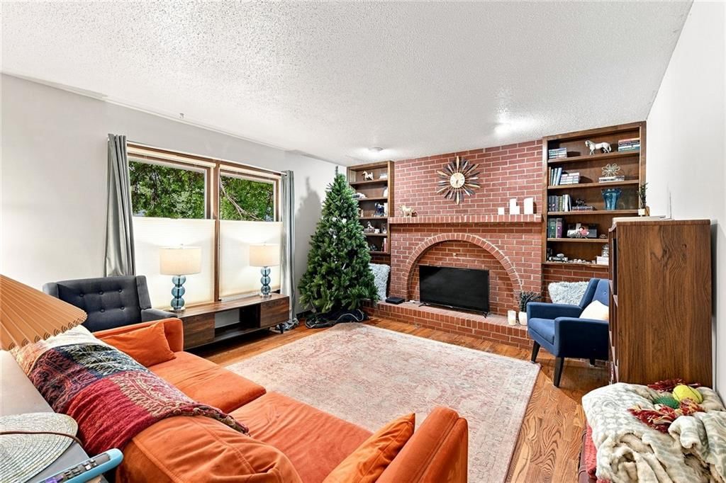 Fireplace and exposed brick wall at 2509 10th Avenue, Leavenworth, KS 66048