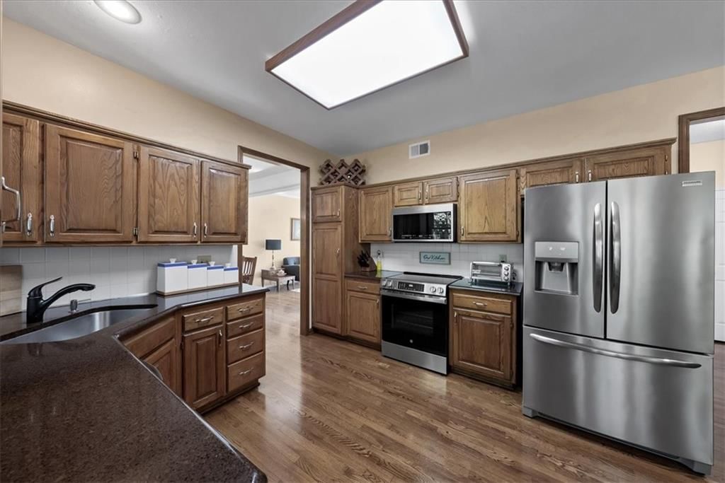 13929 W 76th Circle — photo 15