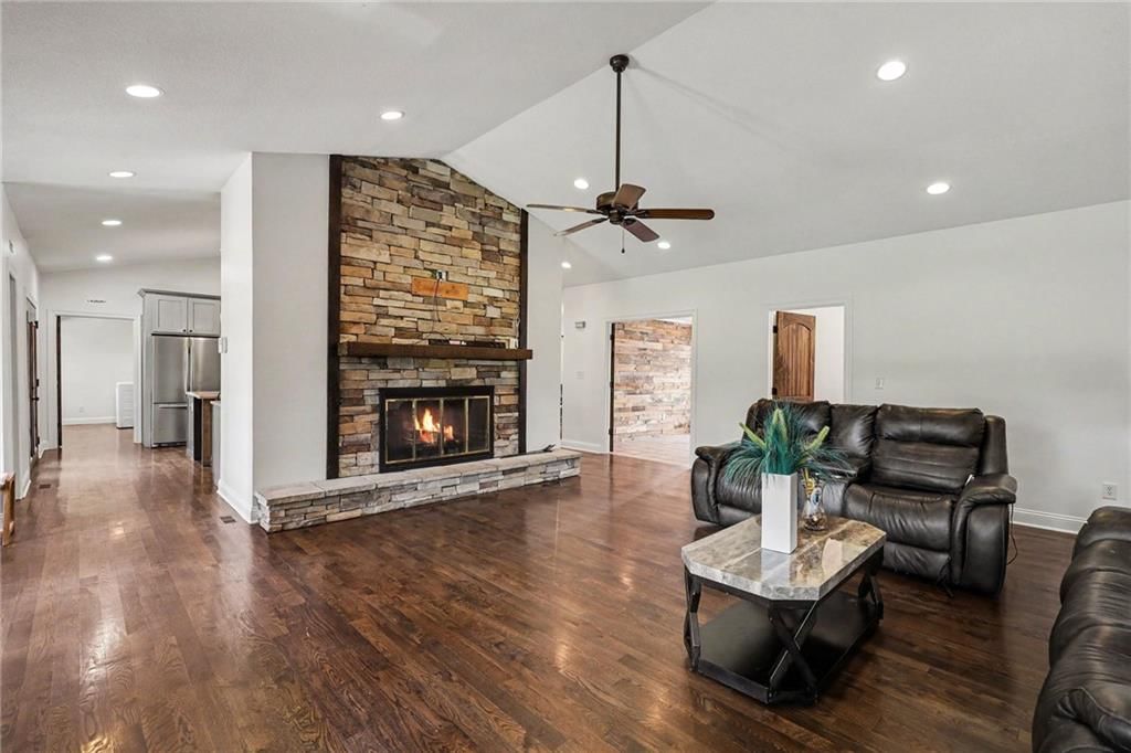 Tall ceilings, fireplace and hardwood floors at 3322 N 67th Street, Kansas City, KS 66104