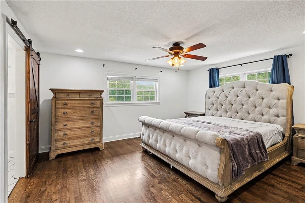 Main-floor primary bedroom at 3322 N 67th Street, Kansas City, KS 66104