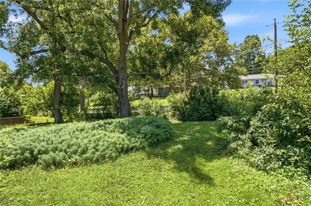 4962 NE Chouteau Drive — photo 36