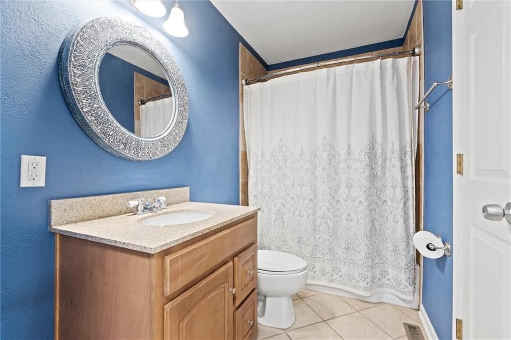 8213 Kenwood Avenue — photo 27