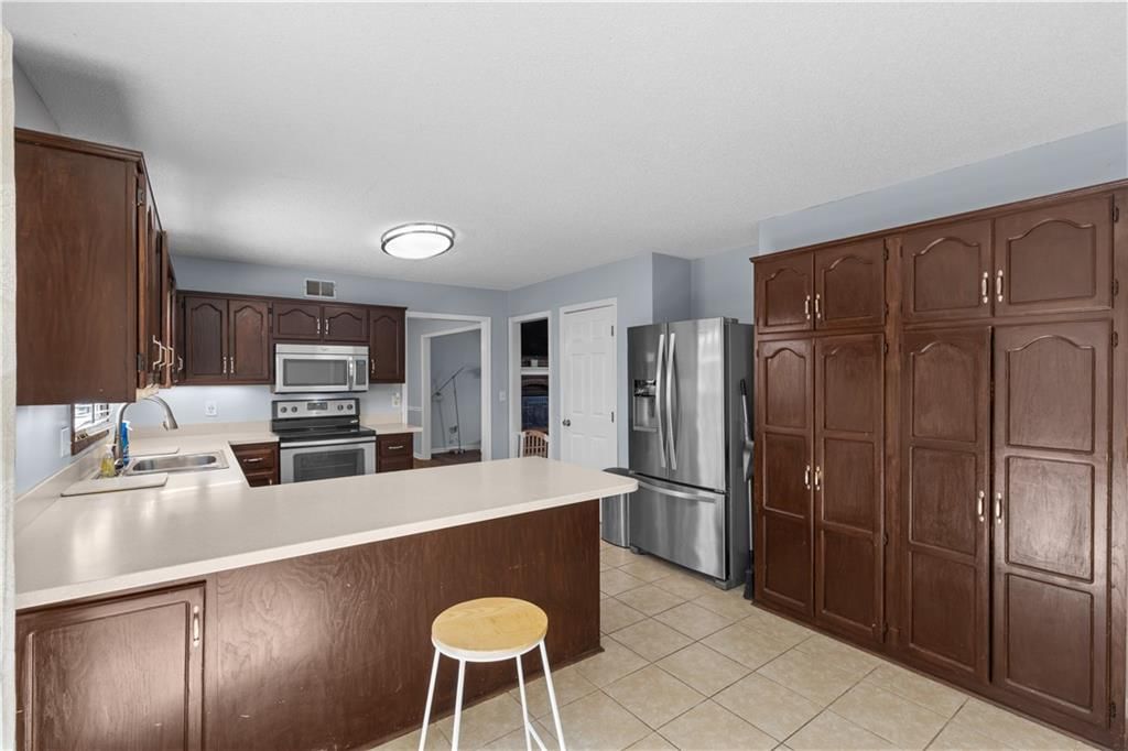 11039 N Baltimore Avenue — photo 12