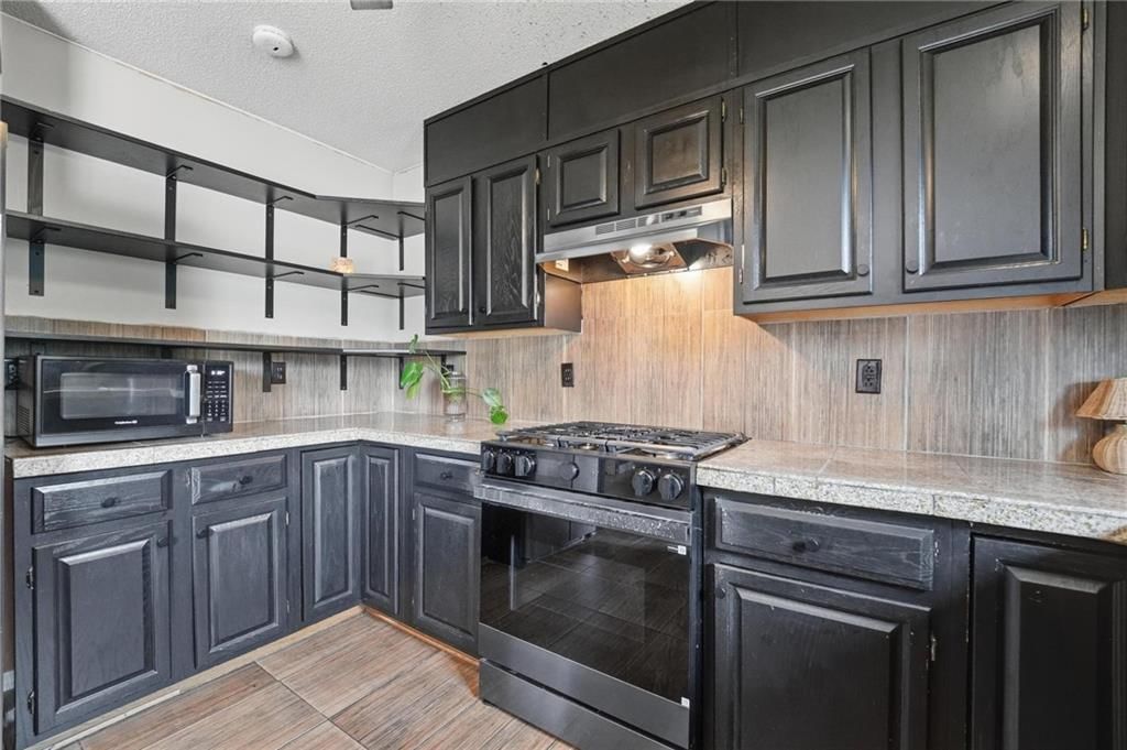 9008 BARNETT Avenue — photo 20