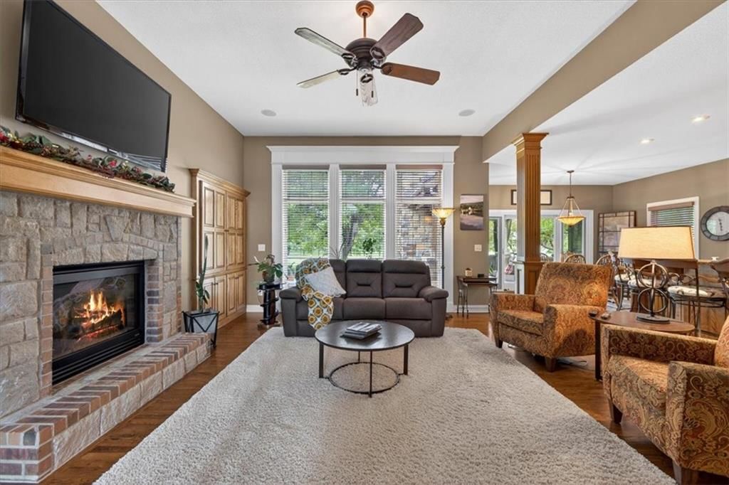 Open floor plan and wall of windows at 9406 Pleasant Avenue, Kansas City, MO 64138