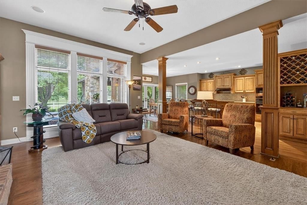 Kitchen island, double oven and breakfast nook at 9406 Pleasant Avenue, Kansas City, MO 64138