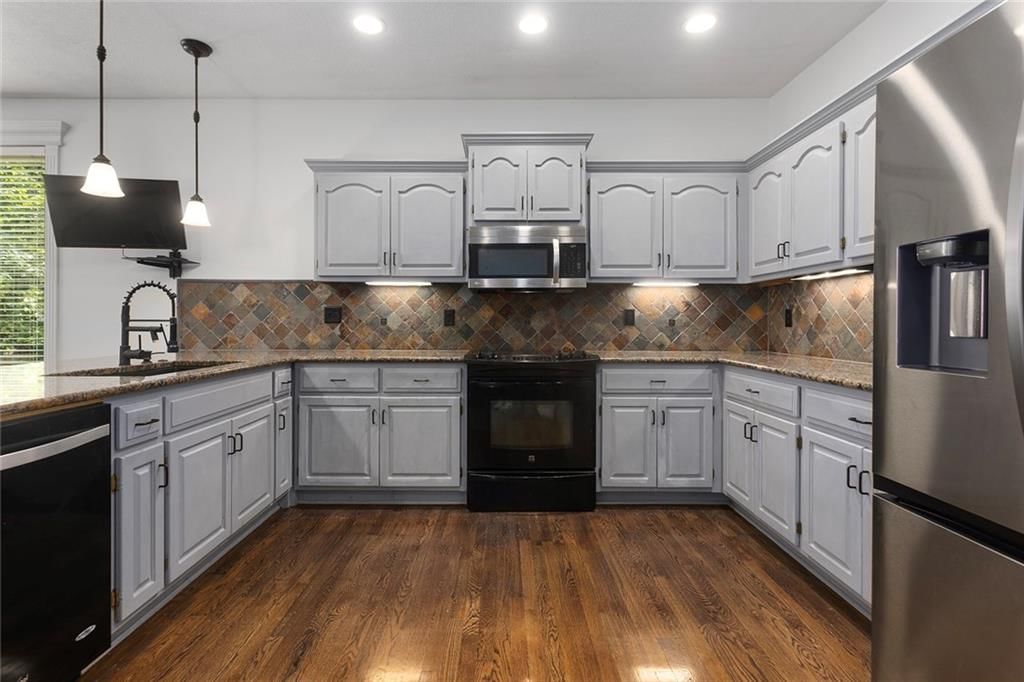 7878 W 155 Terrace — photo 10
