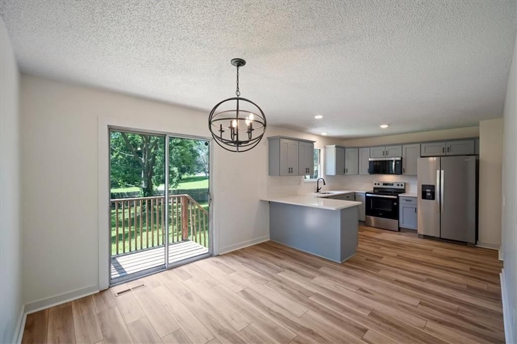 318 SE Bent Tree Drive — photo 4