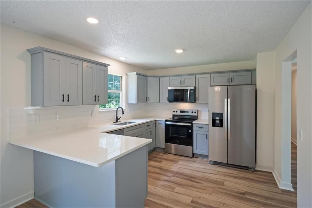318 SE Bent Tree Drive — photo 5