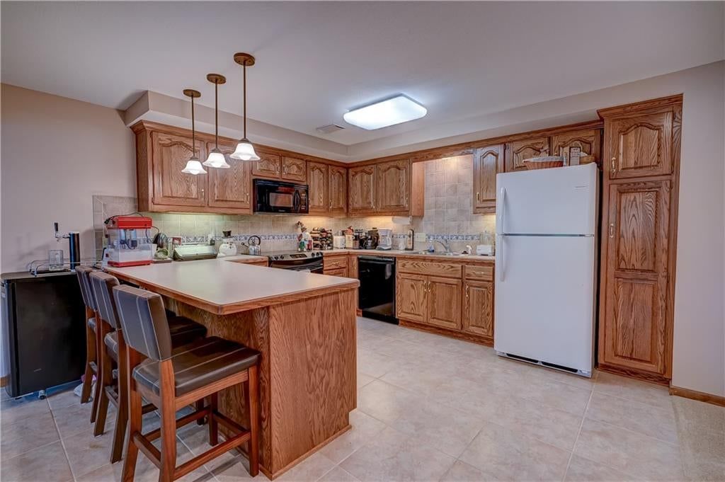 Photo 48 of 60 - 512 Canterbury Lane, Lee's Summit, MO 64063